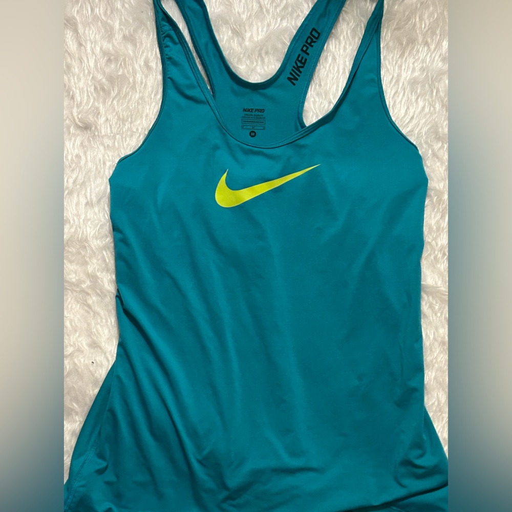 Teal Nike activewear top in MEDIUM